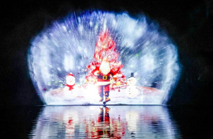 The Lightopia Crystal Palace Experience includes a huge light display over the water.